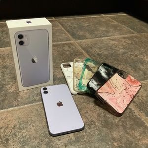 Like new condition - Apple iPhone 11 Lilac Colour 64 GB with 5 phone cases!